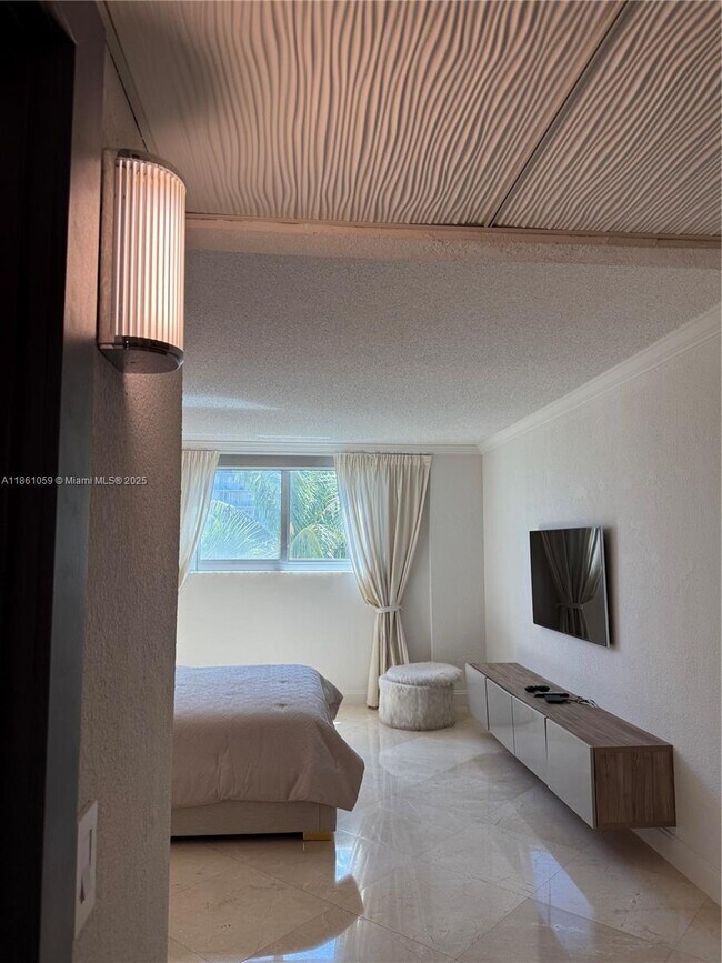 Building Photo - 19380 Collins Ave
