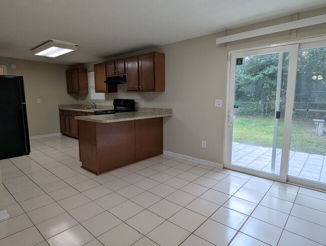 Building Photo - NOW AVAILABLE!! 3/2 House Located in quiet...