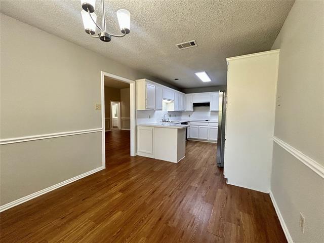 Building Photo - 7724 Sagebrush Ct N