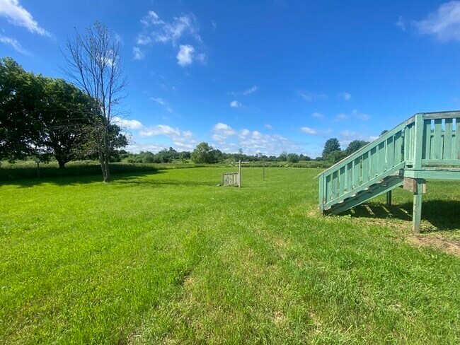 Building Photo - Beautiful secluded 4 bedroom 2.5 bath home with 2 stall detached garage and descent sized yard