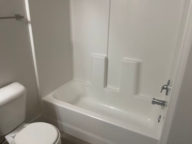 Building Photo - 3 bed | 2.5 bath | 2-car Townhome with Was...