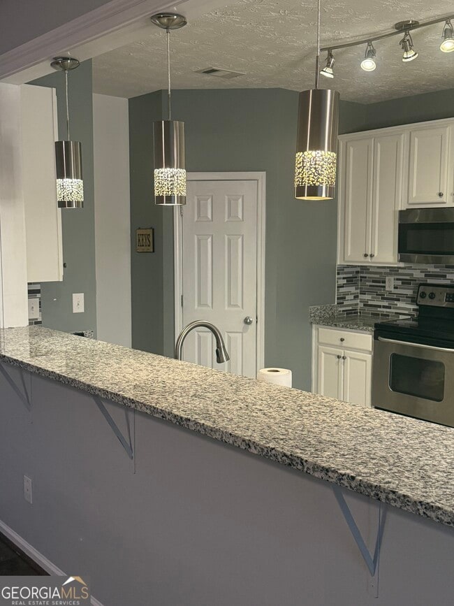 Building Photo - 1221 River Rush Ln NE