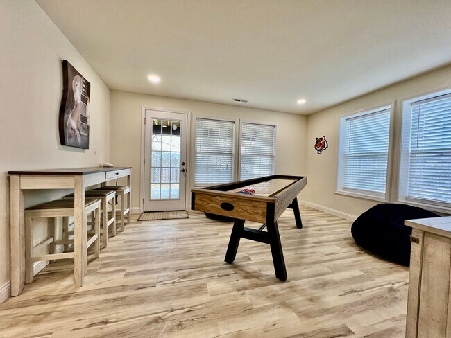 Building Photo - Beautiful NEW Ranch Home with a large deck & games