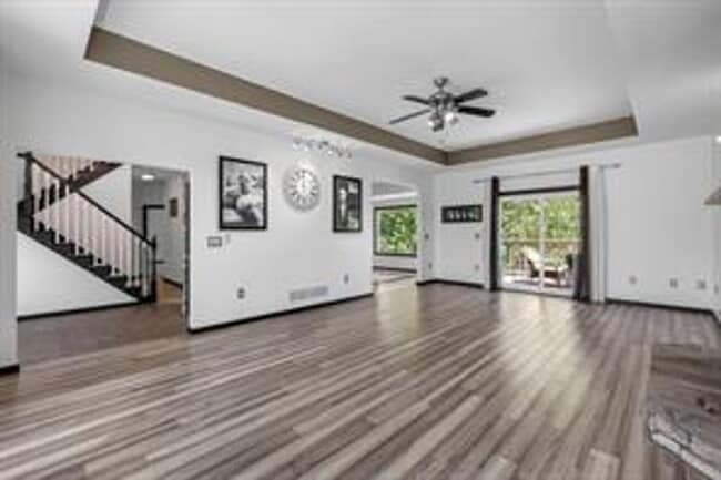 Building Photo - Spacious 5-Bed Walkout Home with Over 3,50...