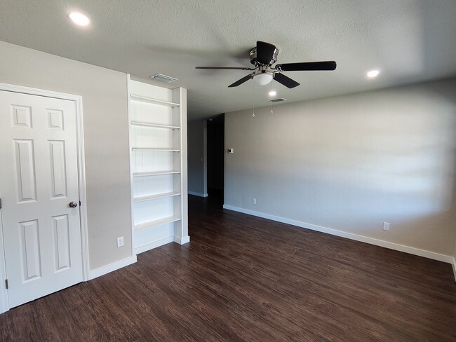 Living Room w/ built-in Bookcase and Closet - 1814 26th St W