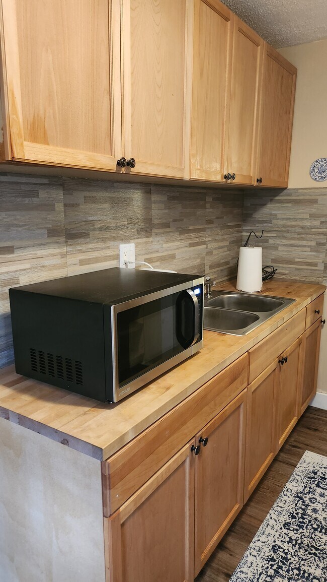 New butcher block counters. - 208 NW 3rd St