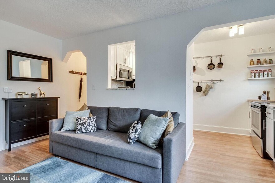 Living room with partial view of kitchen - 1363 K St SE