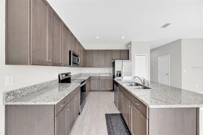 Building Photo - 6321 Tillandsia Pl