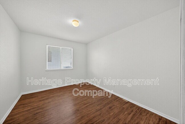 Building Photo - 4935 Dahlia Terrace