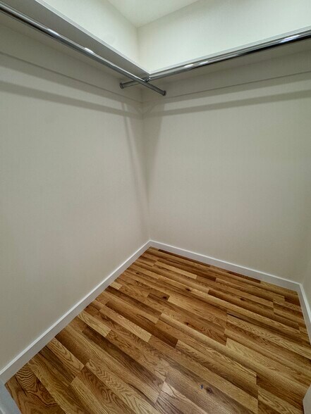 Primary walk-in closet - 5742 Woodman Ave
