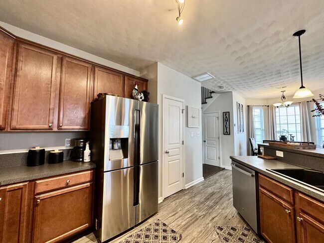 Building Photo - First-Time Rental, Available July 1st! Attached Garage - 2 Primary Suites - Pet-Friendly (Under 4...