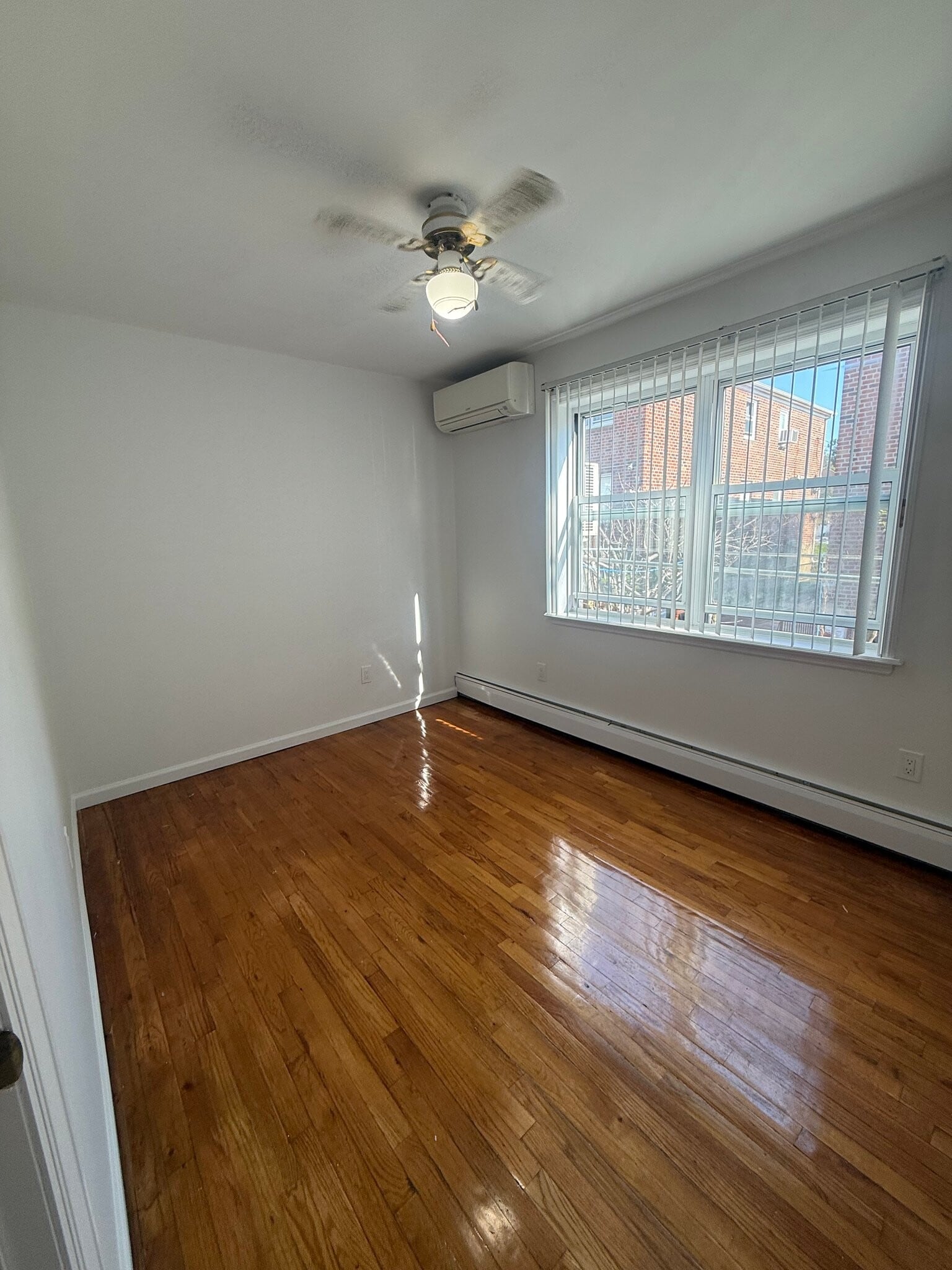 Building Photo - 23-37-37 120th St