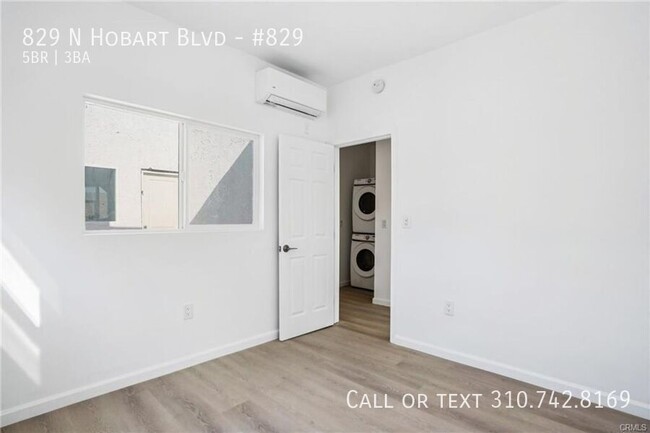 Building Photo - Luxe Living at 825 N. Hobart Blvd. – Where...