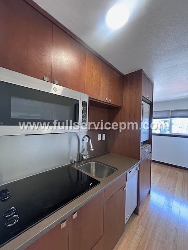 Building Photo - Alki Beach Living! Comfy 1 BD! Puget Sound Views! Super Sunsets!