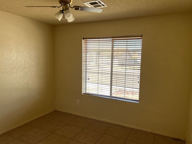 Building Photo - Four Bedroom Mountain View Home with large fenced back yard and double gates