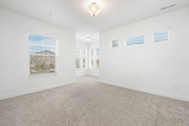 Building Photo - Modern Herriman Condo with Stylish Living & Community Amenities!