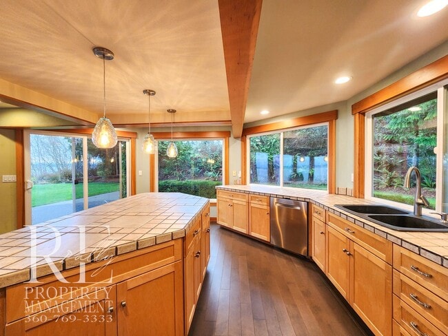 Building Photo - MOVE-IN SPECIAL: 50% OFF FIRST MONTHS RENT - Waterfront Rustic Retreat with Vaulted Ceilings, Pic...