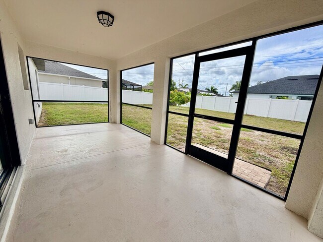 Building Photo - Move-In Ready 3BR Home in SW Cape Coral with Fenced Yar+Screened Lanai+Lawn Care Included+Pet Fri...