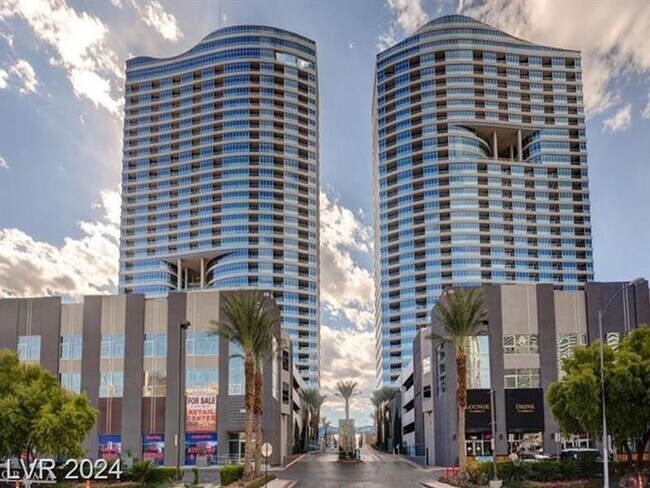 Building Photo - Iconic Strip-View Luxury | Elegant 1BR + Den High-Rise Residence