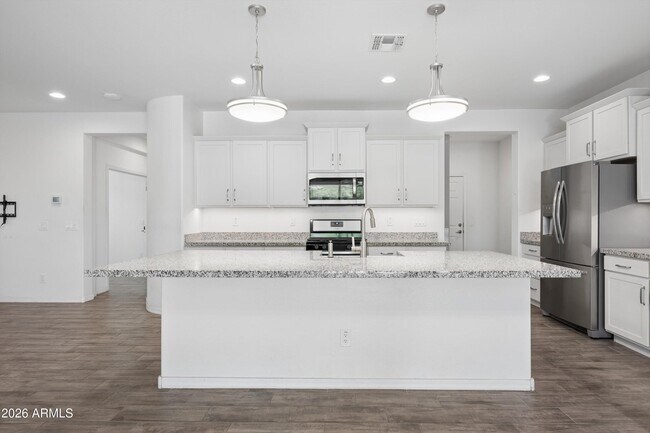 Building Photo - 10445 E Tesla Ave