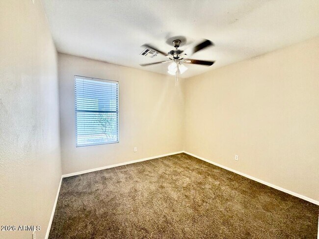 Building Photo - 9323 W Harmony Ln