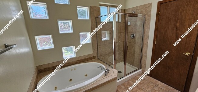 Building Photo - Beautiful and Spacious in NE Heights Gated...