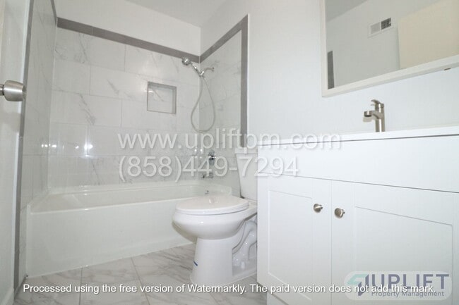 Building Photo - 4 bed, 2 Bath Home With Fenced Yard and attached 2 Car Garage