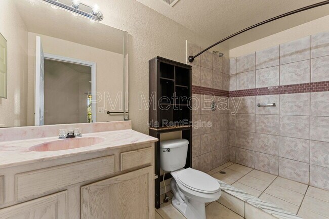 Building Photo - 5039 Sunridge Palms Dr