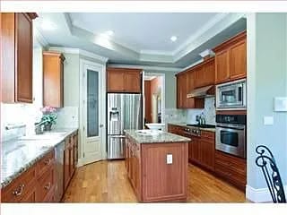 Building Photo - "Elegant 5-Bedroom Oasis with 4 Luxurious ...