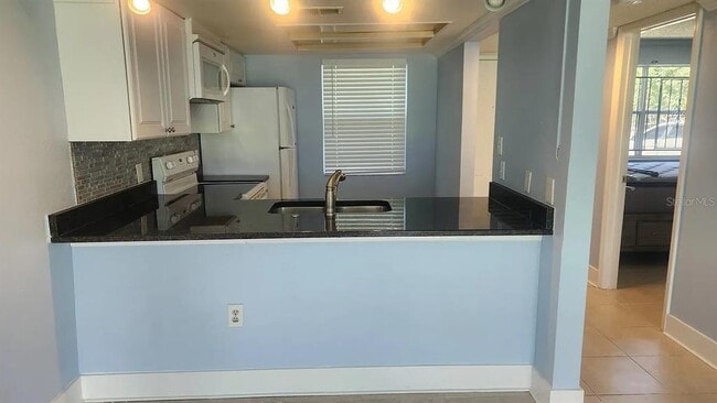 Building Photo - 5038 Terrace Palms Cir