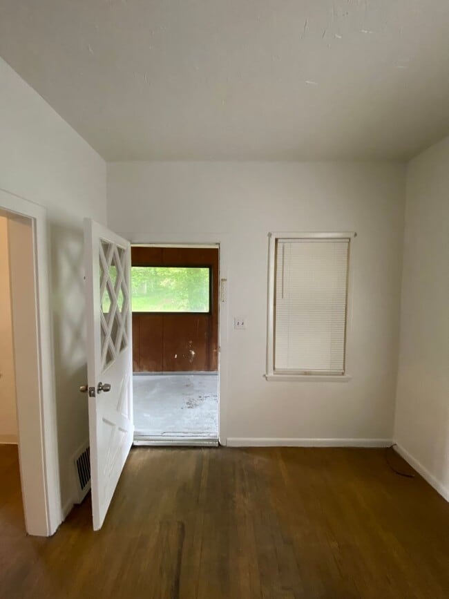 Building Photo - One Bedroom Duplex with off street parking and private enclosed porch