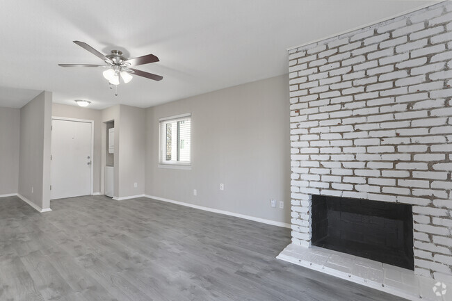 Livingroom w/ fireplace - Soho Apartments