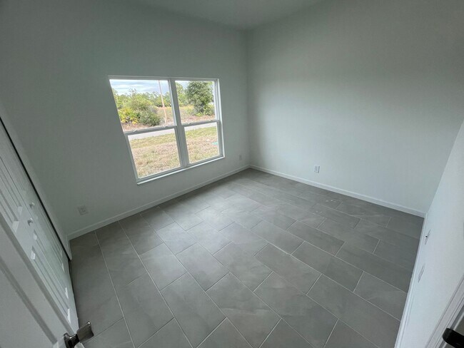 Building Photo - NEW CONSTRUCTION-  Modern 2 Bed / 2 Bath Home in South Lehigh Acres