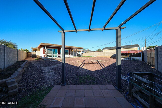 Building Photo - 6539 E Arbor Ave