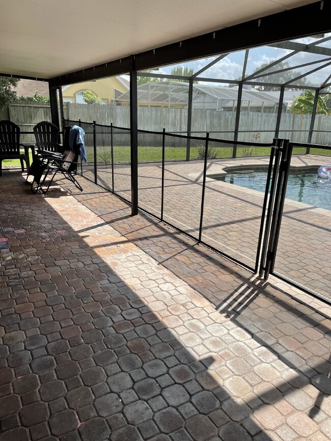 Building Photo - Beautiful 3 Bedroom 2 Bath Pool Home Lawn ...