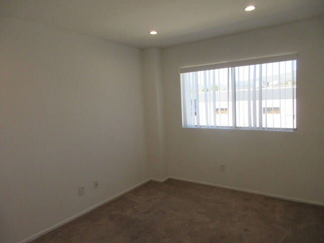 Building Photo - Duggan Property Management, Inc presents  *Reduced*  Canoga Park- 3BD 2.5BA