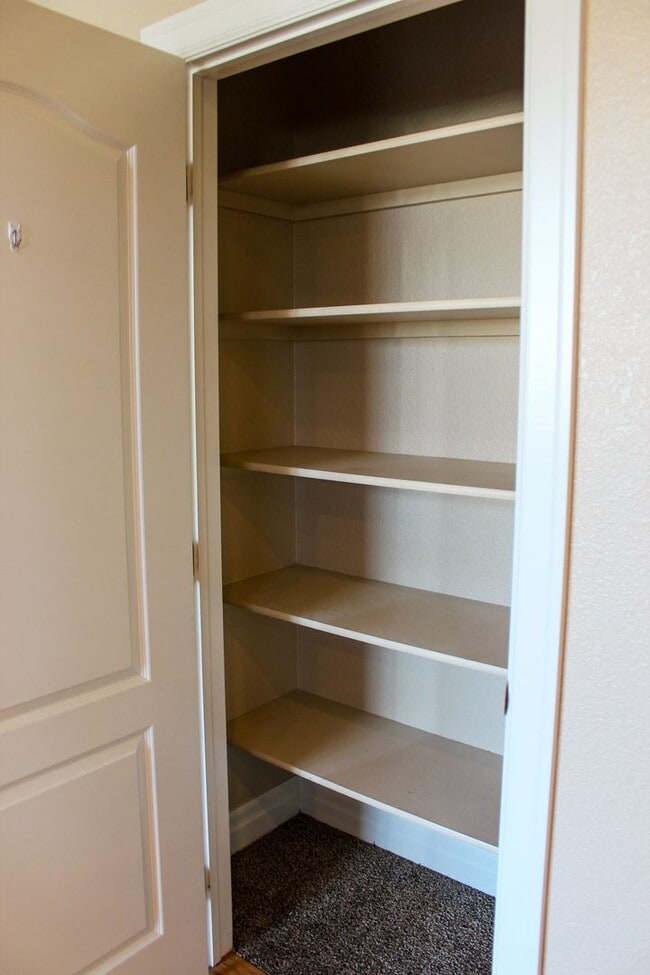 Building Photo - Meticulously maintained townhome on August...