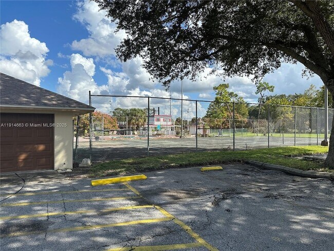 Building Photo - 6060 Village Cir N