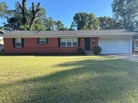 Building Photo - 3 Bedroom Home with Large Backyard near An...