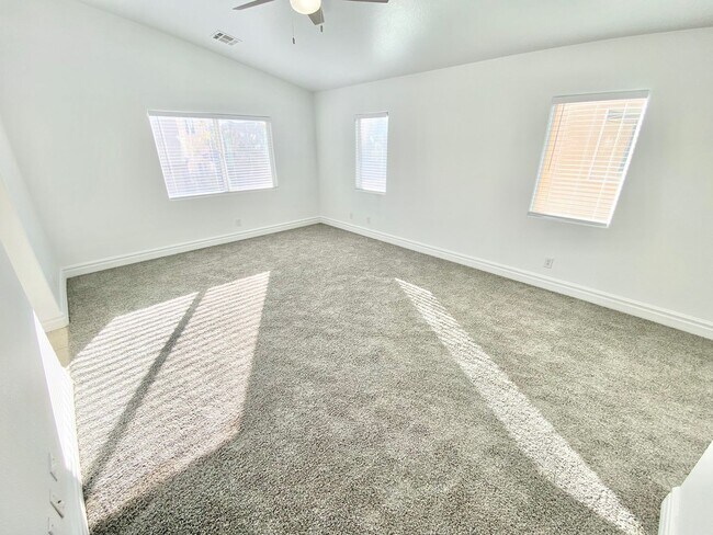 Building Photo - STUNNING 2 STORY HOME IN A GUARD GATED COM...
