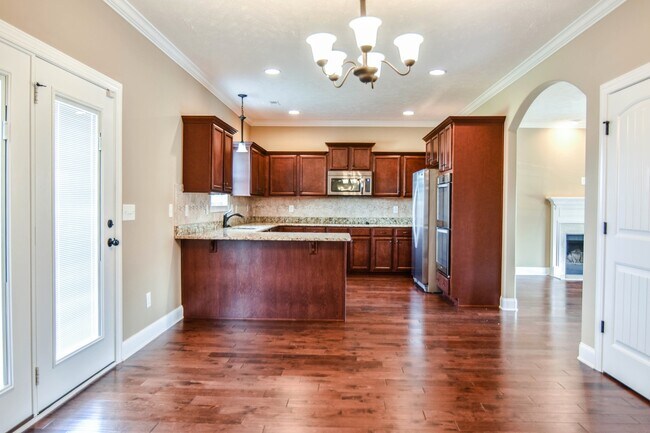 Building Photo - Pet Friendly Three Bedroom with Bonus!