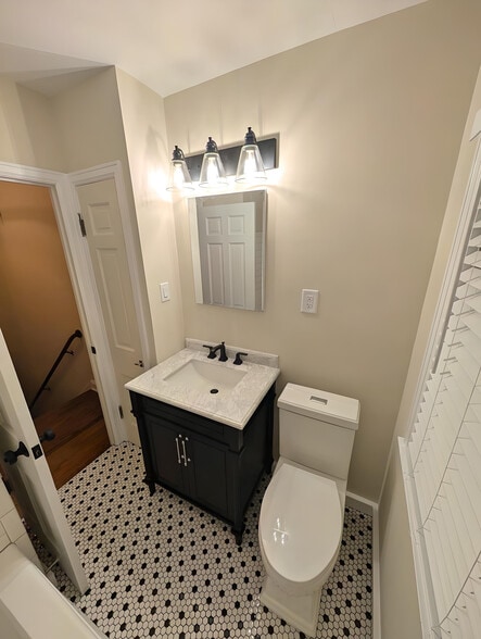 Renovated bathroom with new vanity and toilet - 2734 N Avondale Blvd