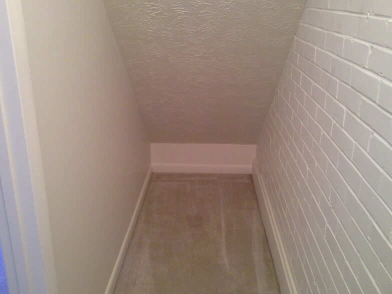 extra storage under stairs - 1110 Madison Ave