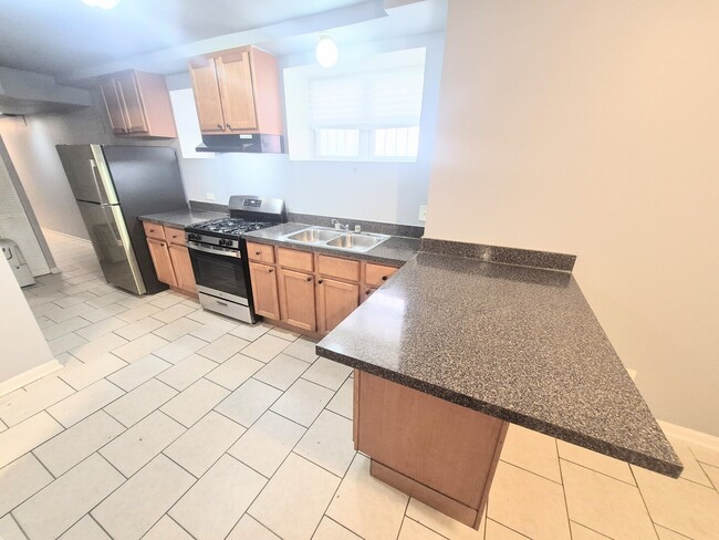 Building Photo - 6030 S Eberhart Ave