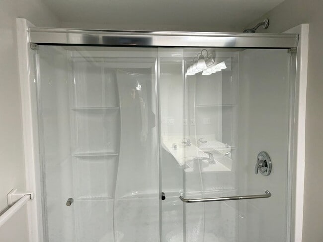 Building Photo - 3 Bed 2 Car Duplex in Grain Valley (New Flooring, Carpet, and Paint)