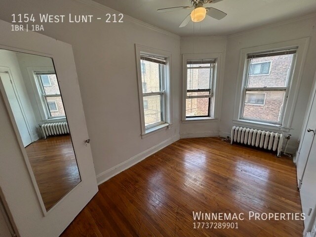 Building Photo - 1154 West Lunt-212