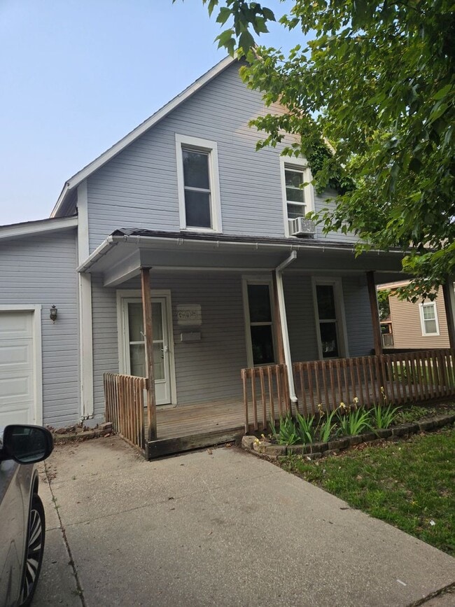 Primary Photo - Characteristic 3-Bedroom Home with Dual Ga...
