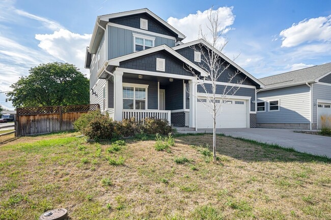 Primary Photo - Bright & Spacious 3-Bedroom Home on a Corn...