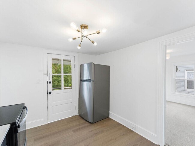 Building Photo - Renovated 3-Bedroom Apartment with Bonus Finished Attic & Spacious Shared Backyard