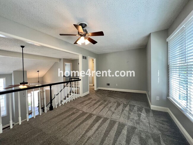 Building Photo - Fantastic Home in Blue Valley Schools w/ Hardwood Floors, Open Layout, Granite Counters, Finished...